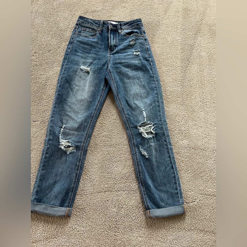 Dark washed ripped jeans